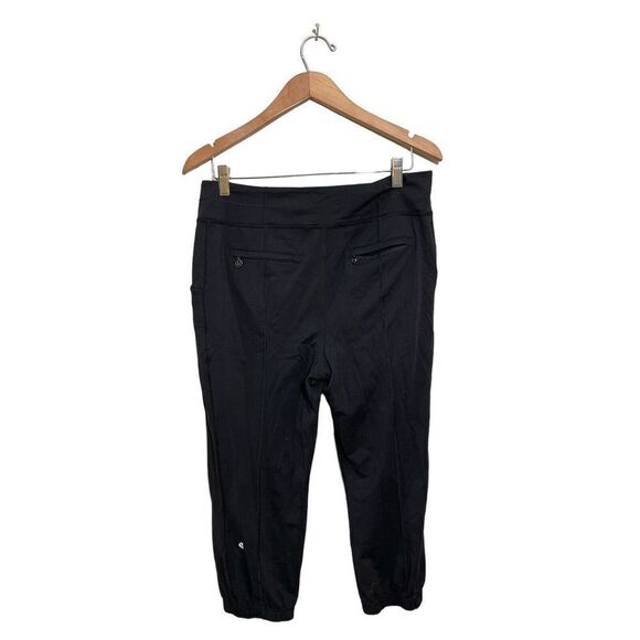 Lululemon Pleated Joggers Womens Size 8 Zip Pockets Cropped Stretch Knit Black‎ - Picture 2 of 6